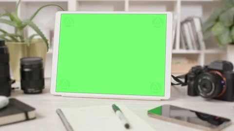 Tablet Computer with Green Screen in Creative Office Interior Stock Footage 170709828