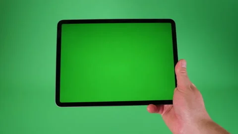 Tablet computer handheld on Green screen Chromakey pt 1 of 14 Stock Footage 194855407