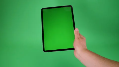 Tablet computer handheld on Green screen Chromakey pt 6 of 14 Stock Footage 194860982