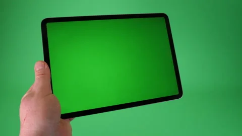 Tablet computer handheld on Green screen Chromakey pt 9 of 14 Stock Footage 194863915
