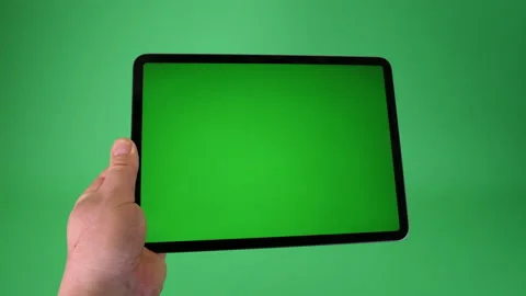 Tablet computer handheld on Green screen Chromakey pt 4 of 14 Stock Footage 194864611
