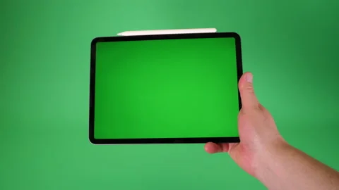Tablet computer handheld on Green screen Chromakey pt 7 of 14 Stock Footage 194867610