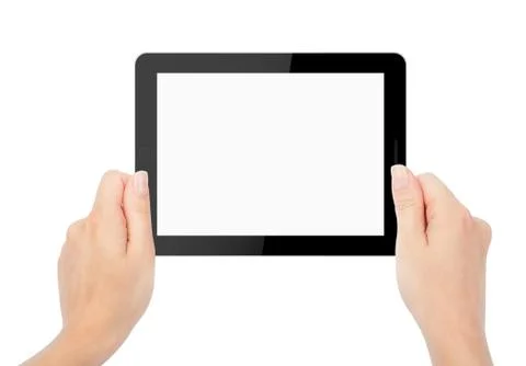Tablet computer isolated in a hand on the white backgrounds. lik Stock Photos