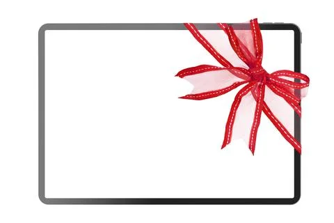 Tablet computer isolated with red ribbon for Christmas Stock Photos