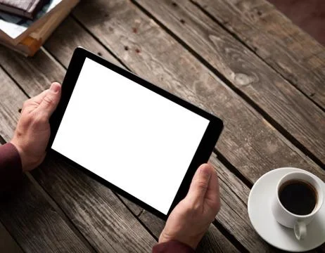 Tablet computer with isolated screen in male hands Stock Photos