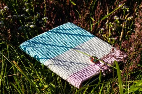 Tablet computer in a knitted cover Stock Photos