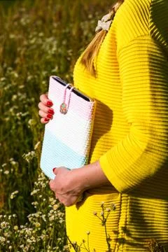 Tablet computer in a knitted cover Stock Photos