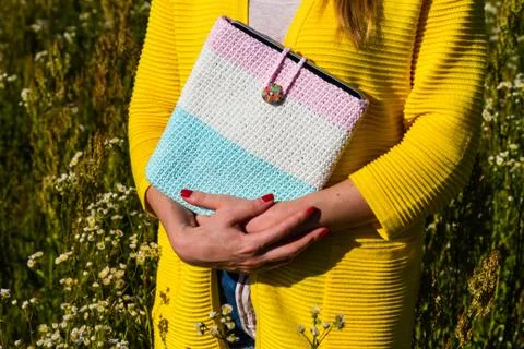 Tablet computer in a knitted cover Stock Photos