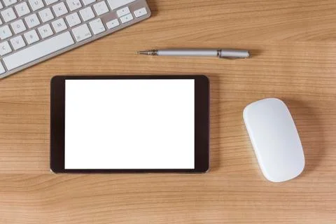 Tablet computer on office desk Stock Photos