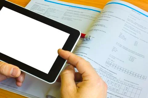 Tablet computer over engineering diagram Stock Photos