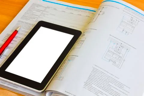 Tablet computer over engineering diagram Stock Photos