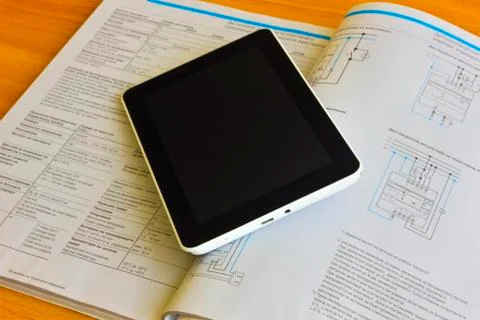 Tablet computer over engineering diagram Stock Photos