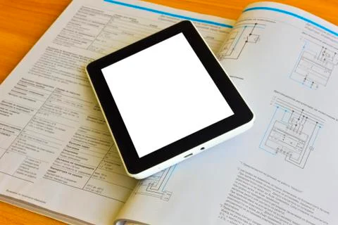 Tablet computer over engineering diagram Stock Photos