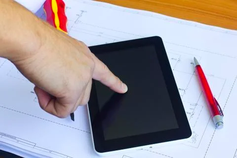 Tablet computer over engineering diagram Foto stock