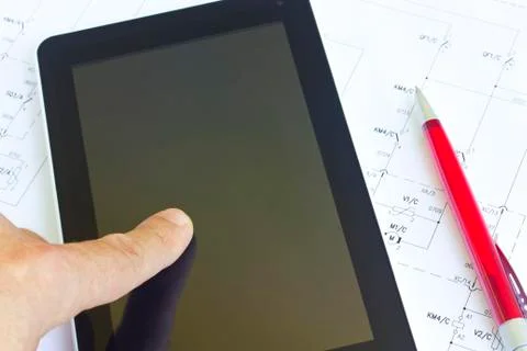 Tablet computer over engineering diagram 스톡 사진