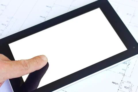 Tablet computer over engineering diagram 스톡 사진