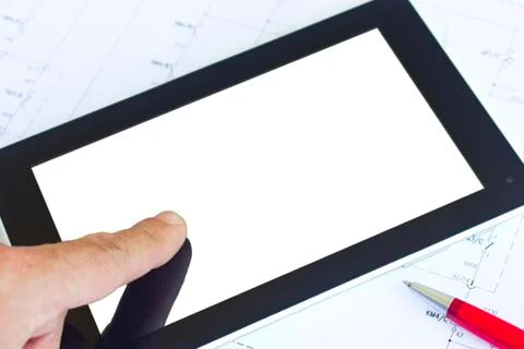 Tablet computer over engineering diagram Stock Photos