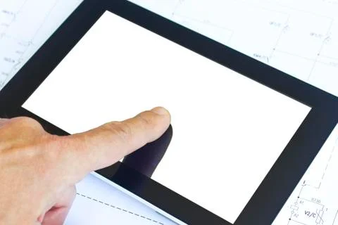 Tablet computer over engineering diagram Stock Photos