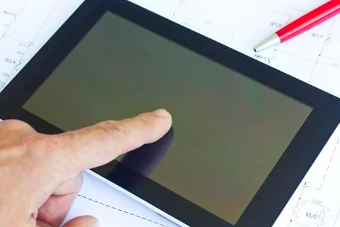 Tablet computer over engineering diagram 스톡 사진
