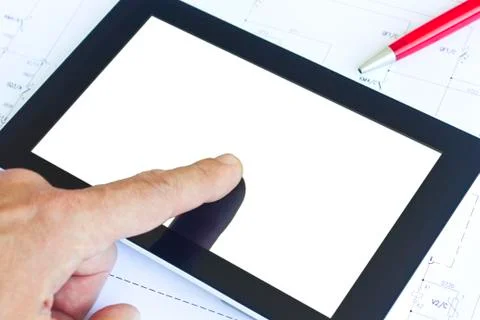 Tablet computer over engineering diagram Stock Photos