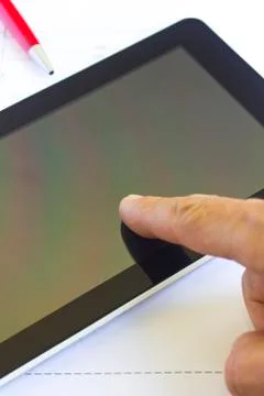 Tablet computer over engineering diagram Stock Photos