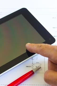 Tablet computer over engineering diagram Foto stock