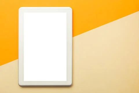 Tablet computer screen mockup with clipping path on orange background Stock Photos