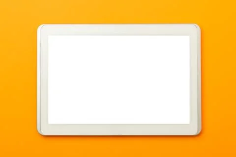 Tablet computer screen mockup with clipping path on orange background Stock Photos