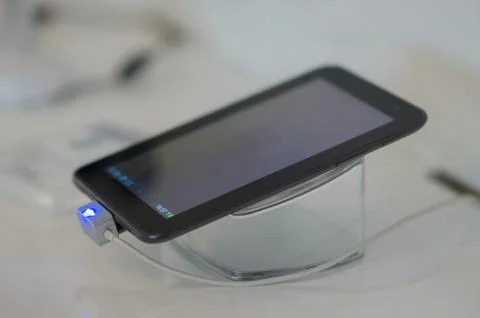 Tablet computer on stand in shop Stock Photos