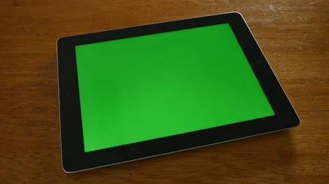 TABLET COMPUTER ON TABLE GREENSCREEN 4K Stock Footage 45203149