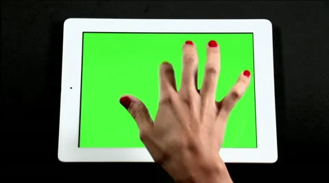 Tablet Computer Touch Screen Finger Gestures on Green Video stock 41919460