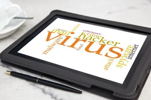 Tablet with computer virus word cloud Stock Photos