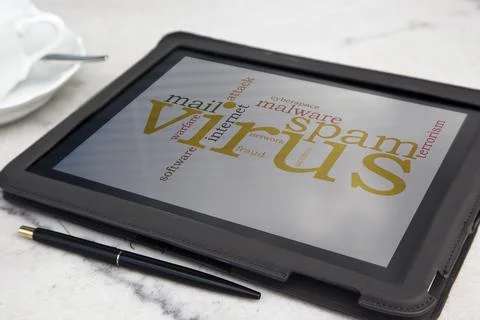 Tablet with computer virus word cloud Stock Photos