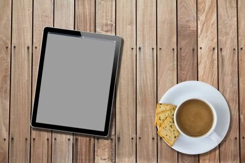 Tablet computer Wood Table with hot coffee Foto stock