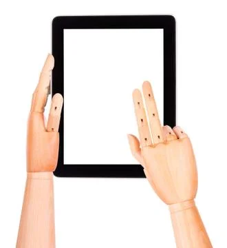 Tablet computer with wooden hand isolated Stock Photos