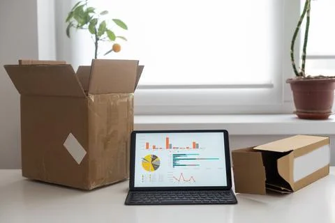 Tablet computers. Online products to prepare product boxes with graph business Stock Photos
