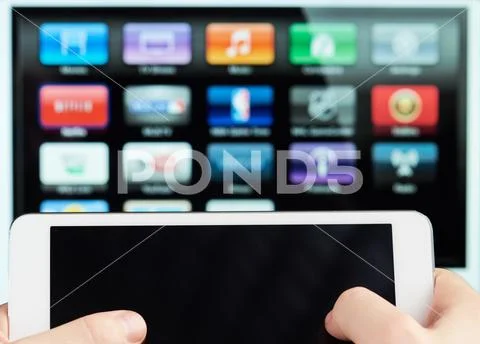 Tablet connect to smart tv Stock Photos