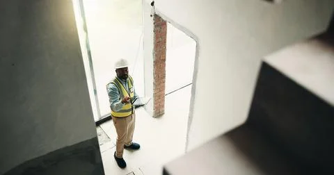 Tablet, construction site and black man for inspection, evaluation or check.. Stock Photos