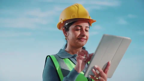 Tablet, construction worker and woman outdoor with engineering app, design Stock Footage 344255216