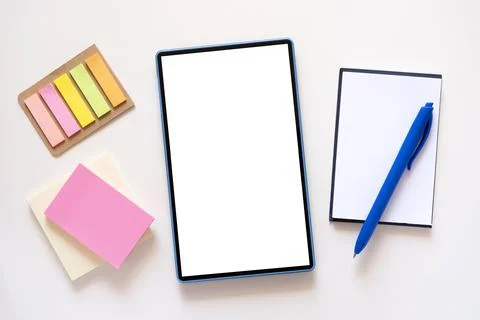 Tablet with copy space, mockup on light beige background. Stationery Stock Photos