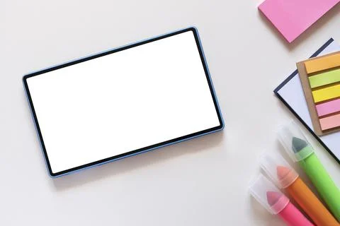 Tablet with copy space, mockup on light beige background. Stock Photos
