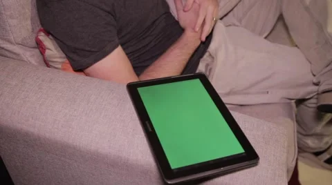 Tablet on Couch - With Person - Green Screen Stock Footage 40261674