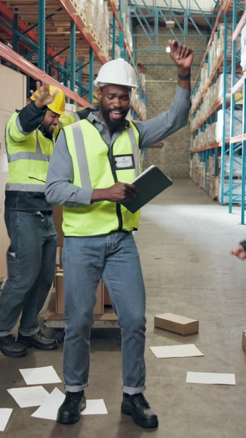Tablet, dance and logistics employees in warehouse for good news, delivery or Stock Footage 340774980