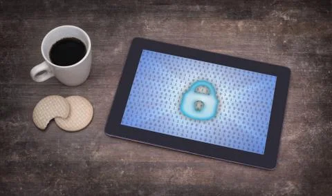 Tablet on a desk, concept of data protection Photos