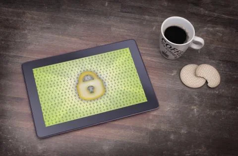 Tablet on a desk, concept of data protection Photos