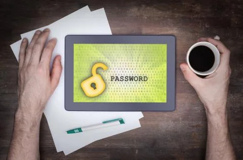 Tablet on a desk, concept of data protection Photos