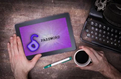 Tablet on a desk, concept of data protection Photos