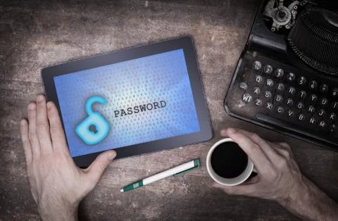 Tablet on a desk, concept of data protection Photos