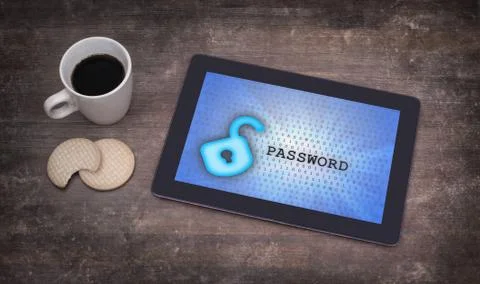Tablet on a desk, concept of data protection Photos