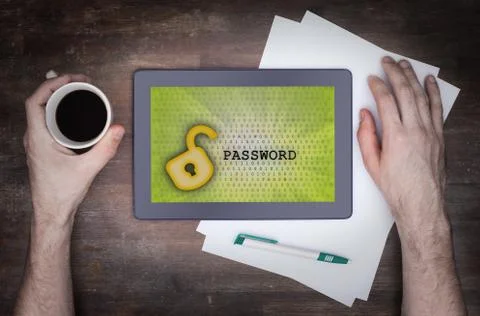 Tablet on a desk, concept of data protection Photos